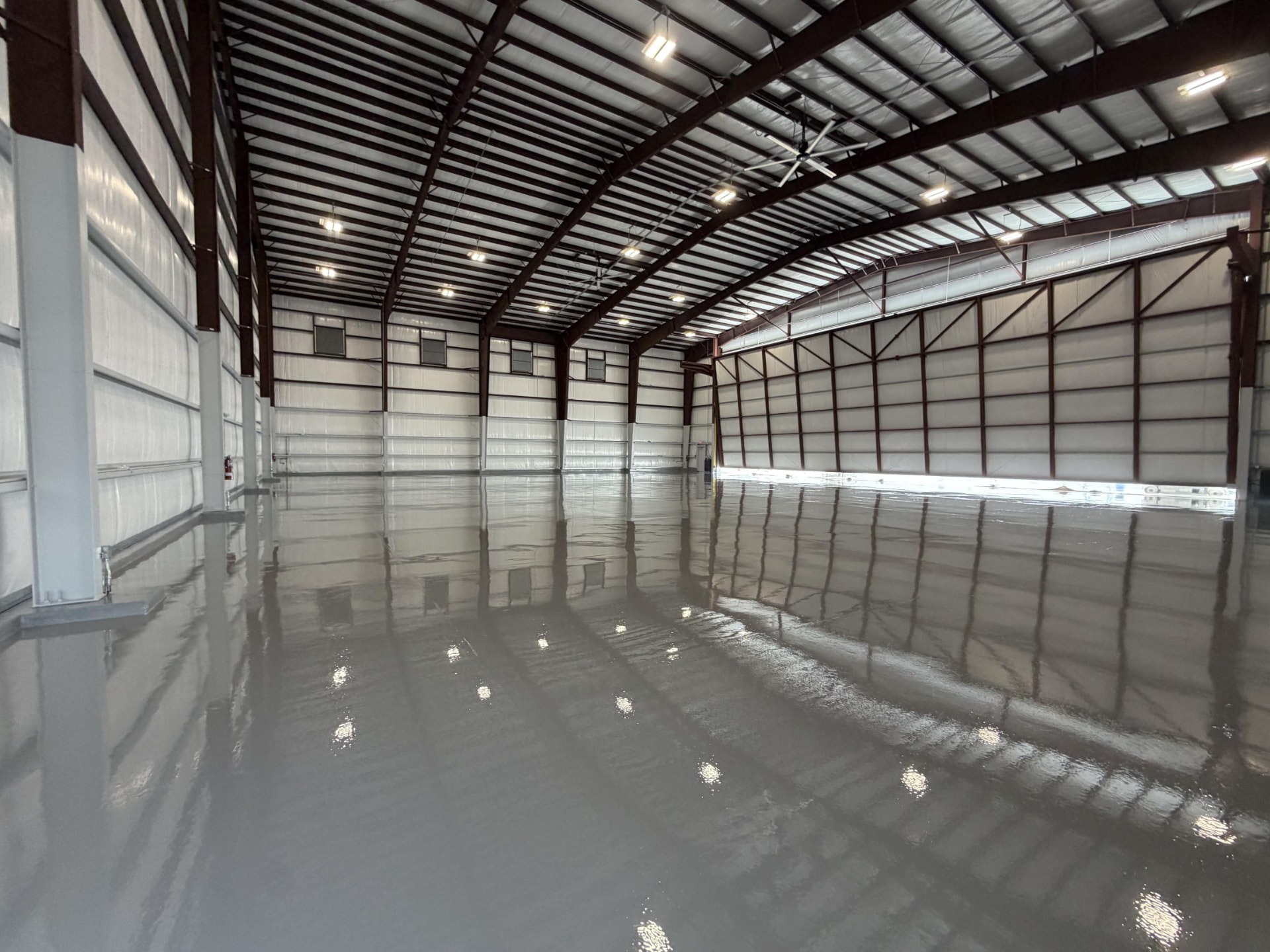 PUNTA GORDA AIRPORT FBO HANGAR epoxy resinous flooring floor in PUNTA GORDA, FL - photo 1